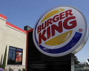 This April 25, 2019, file photo shows a Burger King in Redwood City, Calif. Burger King is announcing its work to help address a core industry challenge: the environmental impact of beef. Credit - AP Photo/Jeff Chiu, File