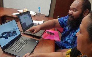 John Kaituu of IUCN ORO with one of the training participants. credit - IUCN