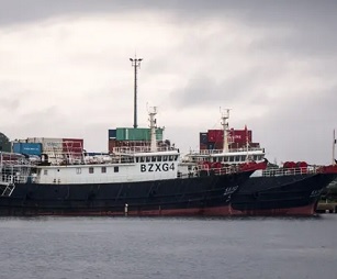 A pair of Chinese fishing vessels - the Dong Gangxing 13 and the Dong Gangxing 16 - are being held at an unused wharf in Port Vila. The ships’ captains and crews face charges of illegal fishing in Vanuatu waters. Photograph: Dan McGarry/The Guardian