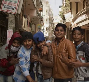 Children on the streets of Delhi, India. India has the second-worst air quality in the world that is cutting short the average life expectancy of Indians by 5.2 years. Photograph: 8 Billion Angels Productions