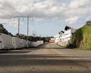 A test strip of road which incorporates coffee cups from the Simply Cups program. Photograph: Carly Earl/The Guardian