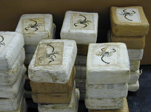 Packs of cocaine seized as they were being smuggled into the US. Image: US Federal DEA, CC BY-SA 2.0 via Wikimedia Commons