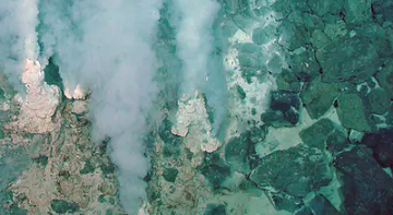 Minerals and carbon dioxide escape from the Earth’s crust into an ocean at this deep-sea vent. NOAA