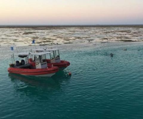 Issuing permits for human activities at larger scales than the particular individual marine features of interest, such as reefs or islands, is part of effective management. Credit: Graeme Cumming