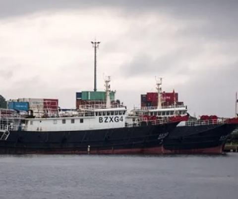 A pair of Chinese fishing vessels - the Dong Gangxing 13 and the Dong Gangxing 16 - are being held at an unused wharf in Port Vila. The ships’ captains and crews face charges of illegal fishing in Vanuatu waters. Photograph: Dan McGarry/The Guardian