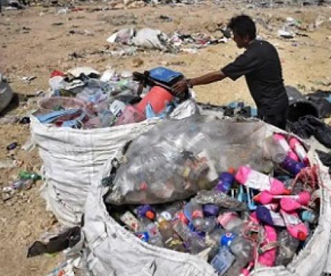 Recyclable plastic is gathered at the Ban Tarn landfill site in the northern Thai province of Chiang Mai. Photograph: Lillian Suwanrumpha/AFP/Getty
