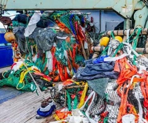 Two large fish-aggregating devices sit on the deck of a tuna purse-seine fishing vessel. Among the components are used salt bags, which are made of plastic. Photo: Francisco Blaha.
