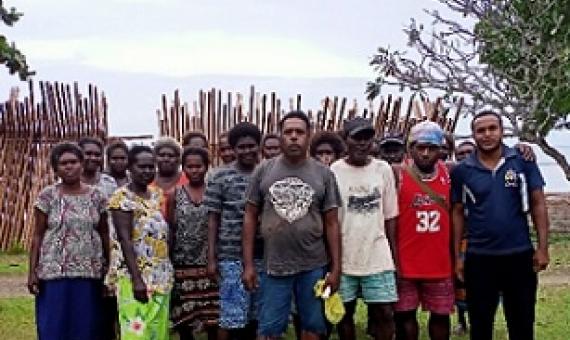ECD Officer Fredrick Dotho with some of the Community Elders during the meeting in Leona Village, North Vella Lavella. Photo: Ravin Dhari. 
