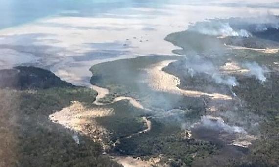 Queensland Parks and Wildlife Service said the fire was burning on two fronts. Credit - Holly Robertson