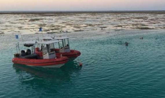 Issuing permits for human activities at larger scales than the particular individual marine features of interest, such as reefs or islands, is part of effective management. Credit: Graeme Cumming
