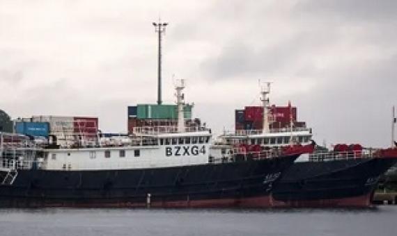 A pair of Chinese fishing vessels - the Dong Gangxing 13 and the Dong Gangxing 16 - are being held at an unused wharf in Port Vila. The ships’ captains and crews face charges of illegal fishing in Vanuatu waters. Photograph: Dan McGarry/The Guardian