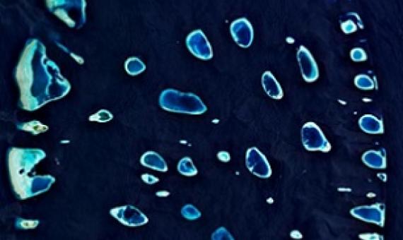 The Maldives, seen in part from above, is comprised of 1,192 islands. The tiny island nation also has the world’s highest levels of microplastics in its beach sand and offshore waters. PHOTOGRAPH COURTESY EUROPEAN SPACE AGENCY