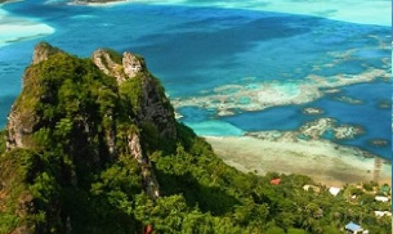 Coral reefs extend toward the horizon in this bird’s-eye view from Maupiti, French Polynesia. Leaders from more than 70 countries, including France, have publicly supported a new target to protect 30% of the global ocean by 2030. Credit - Shutterstock