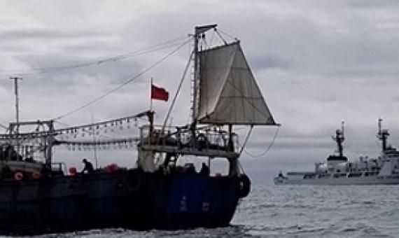 The crew of the Coast Guard Cutter Douglas Munro conducts a boarding of a Chinese fishing vessel. Credit - USCG