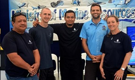 The team from the Ministry of Marine Resources at their information booth. Credit - Alana Musselle, www.cookislandsnews.com