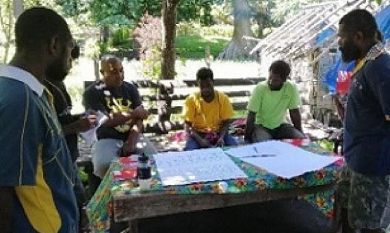 Summit participants engaging in group discussions. Credit - https://dailypost.vu/