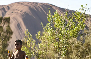 The Anangu community of Mutitjulu stands in stark contrast to the sleek tourism infrastructure in the neighbouring town of Yulara. Lukas Coch/AAP